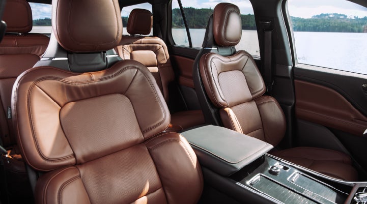 The front row's Perfect Position Seats in a 2024 Lincoln Aviator® Reserve model with Ebony Roast interior | Griffin Lincoln in Tifton GA