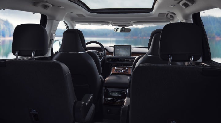 The interior of a 2024 Lincoln Aviator® SUV from behind the second row | Griffin Lincoln in Tifton GA
