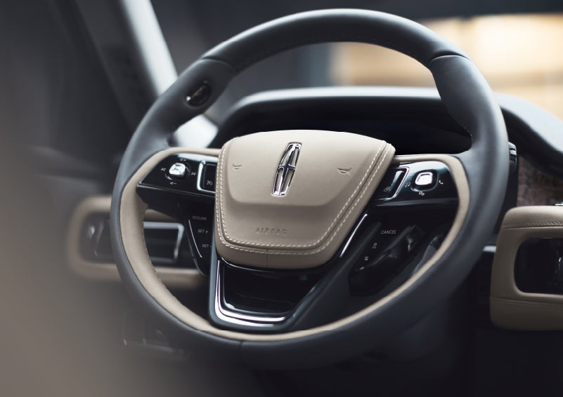 The intuitively placed controls of the steering wheel on a 2024 Lincoln Aviator® SUV | Griffin Lincoln in Tifton GA