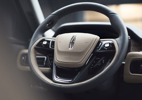 The intuitively placed controls of the steering wheel on a 2024 Lincoln Aviator® SUV | Griffin Lincoln in Tifton GA
