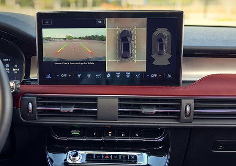 The driver of a 2024 Lincoln Corsair® SUV is shown selecting the drive mode. | Griffin Lincoln in Tifton GA