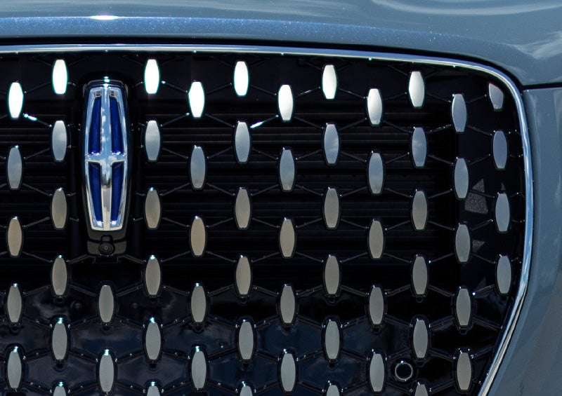 A 2025 Lincoln Corsair® Grand Touring model is shown in the Whisper Blue exterior color.