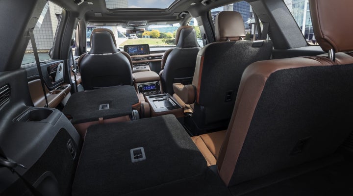 One side of the PowerFold® third-row seat and a second-row seat are folded forward in the 2026 Lincoln Aviator® SUV. | Griffin Lincoln in Tifton GA