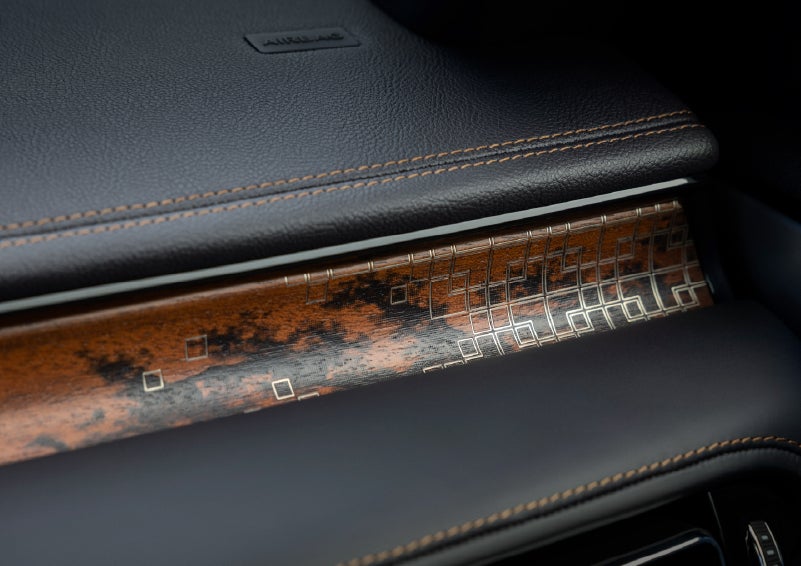 A close-up shot of the 2026 Lincoln Aviator® dashboard with unique black and brown accents and brown stitching. | Griffin Lincoln in Tifton GA