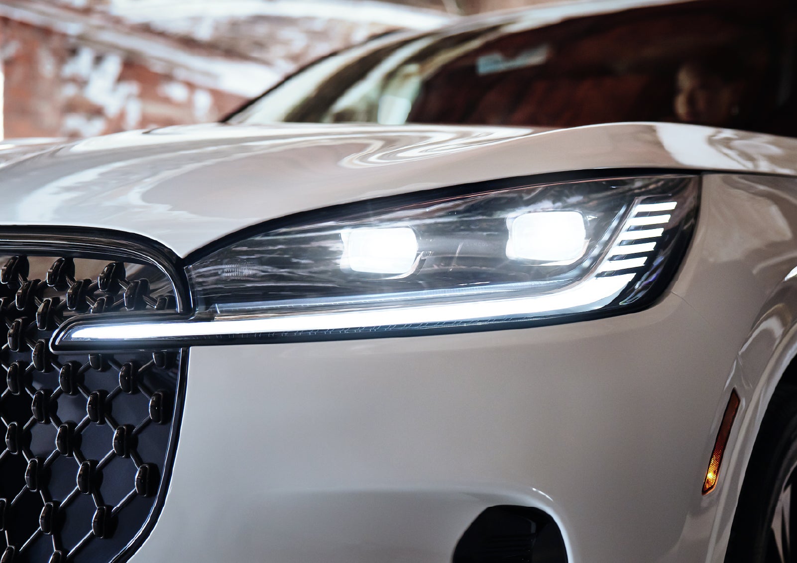 A close-up of a headlamp on the 2027 Lincoln Aviator® SUV is shown. | Griffin Lincoln in Tifton GA