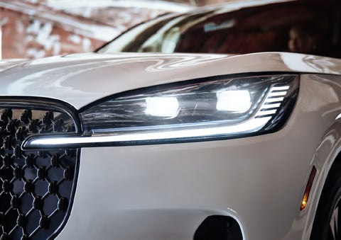 A close-up of a headlamp on the 2027 Lincoln Aviator® SUV is shown. | Griffin Lincoln in Tifton GA